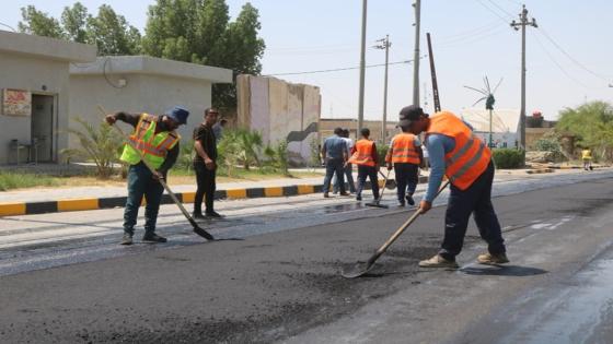 وحدة التنفيذ المباشر في مديرية بلدية النجف تباشر باعمال اكساء شارع الجنسية